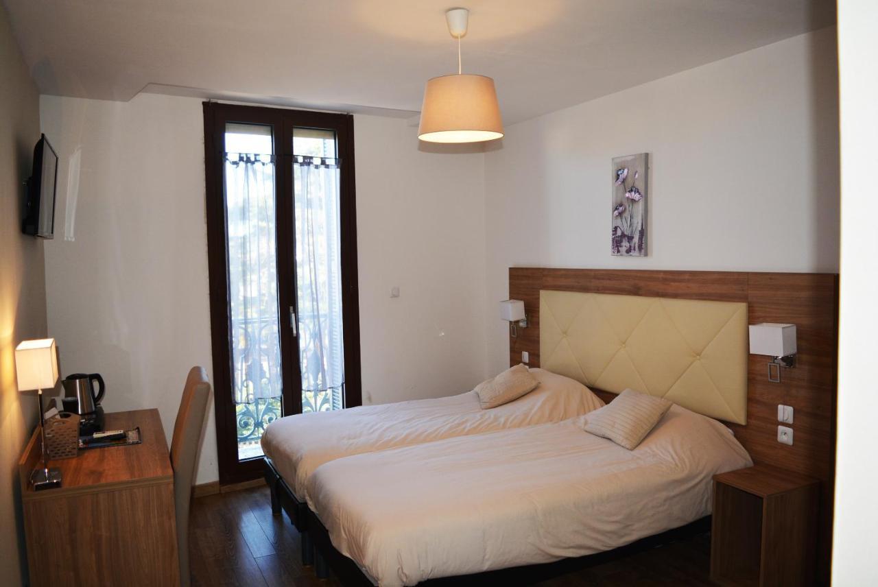 Le Grand Hotel Moliere Pezenas Bagian luar foto